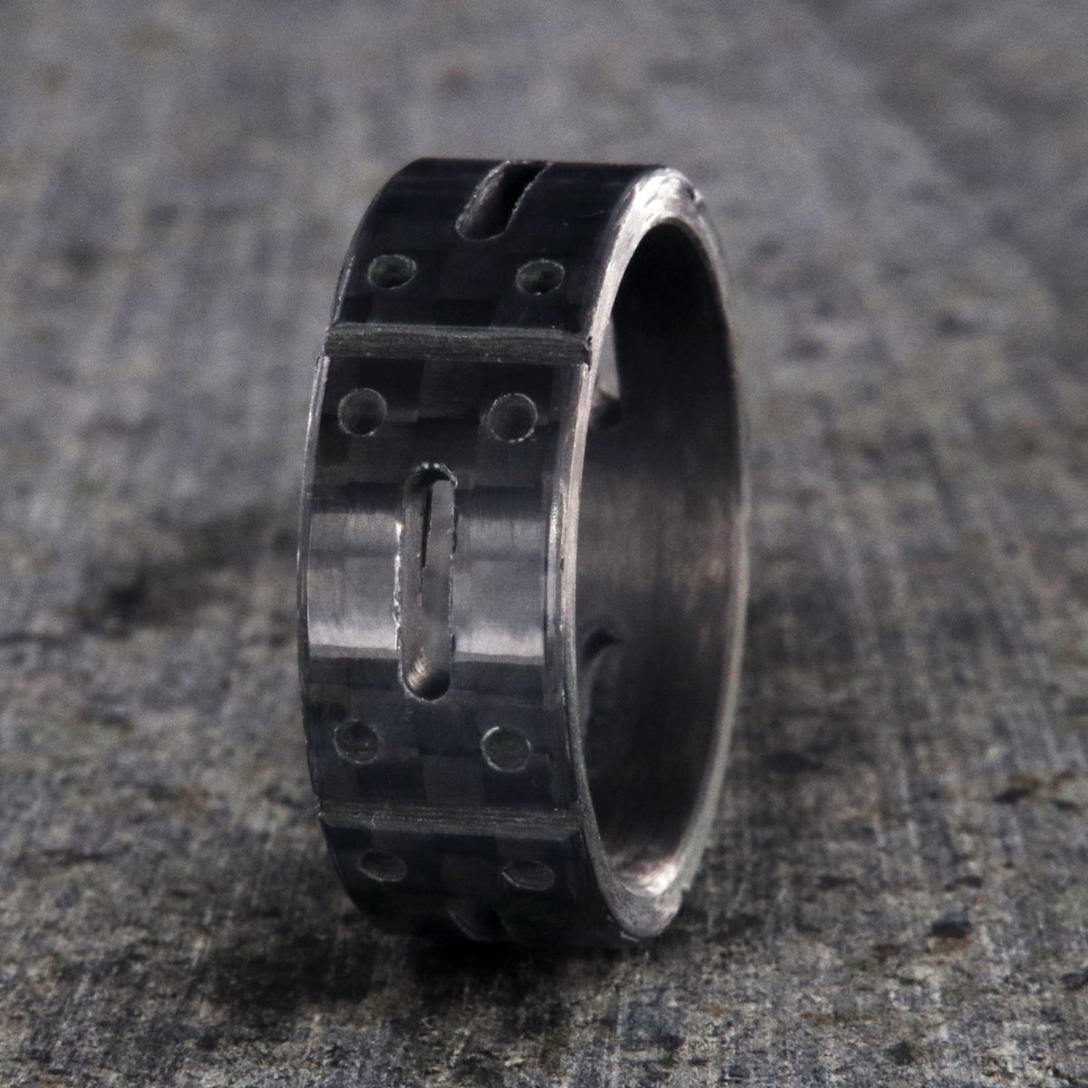 8mm wide black carbon fiber ring with a carved matrix pattern
