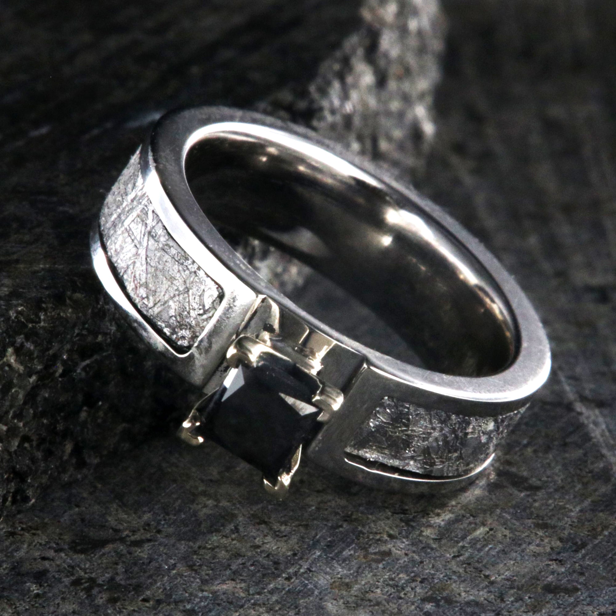 6mm wide meteorite engagement ring with princess cut black diamond