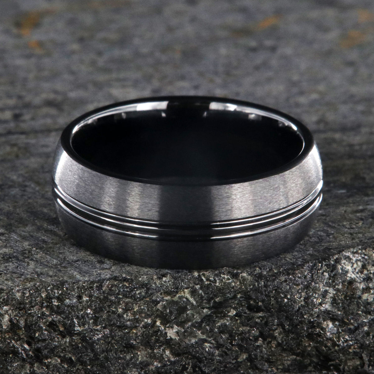 8mm wide black titanium wedding band with a center dual groove and rounded profile