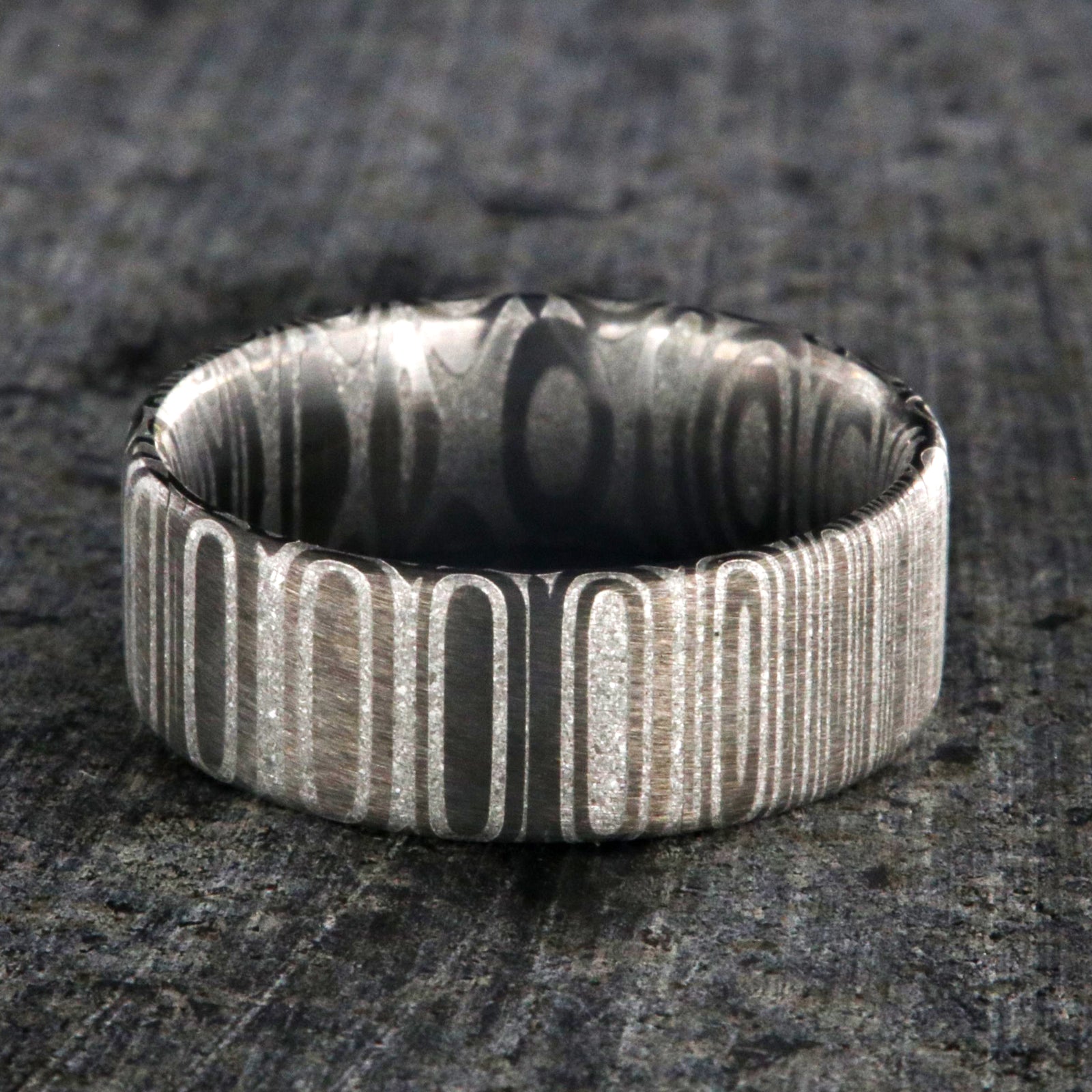 8mm wide Damascus steel wedding band with flat profile