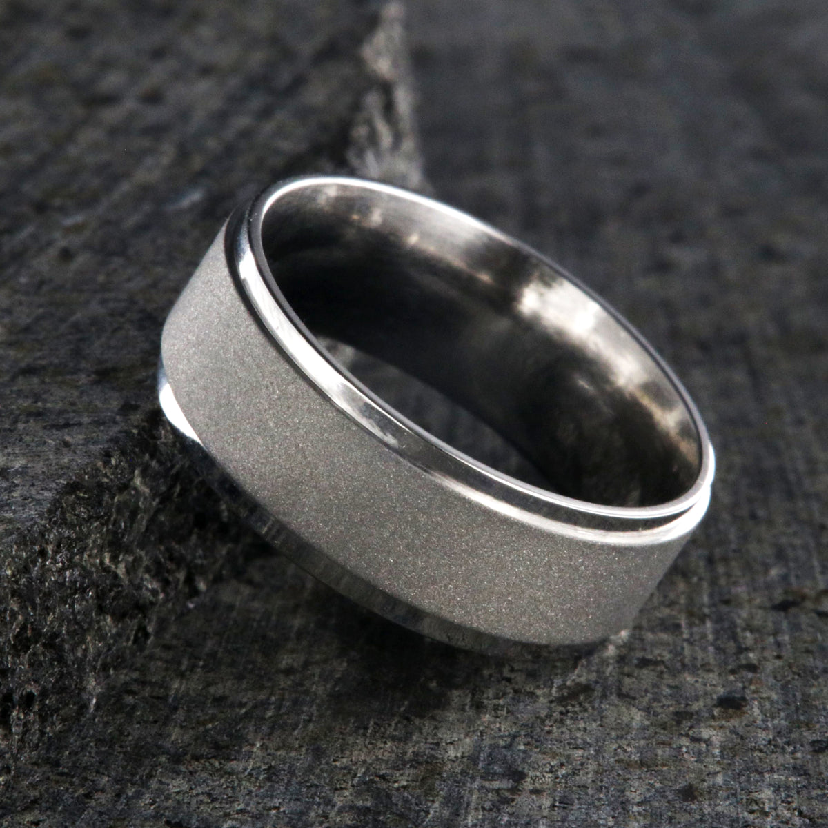 8mm wide cobalt wedding band with a raised-center and sandblasted finish