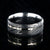 8mm wide black Damascus steel wedding band with a white gold inlay and flat profile