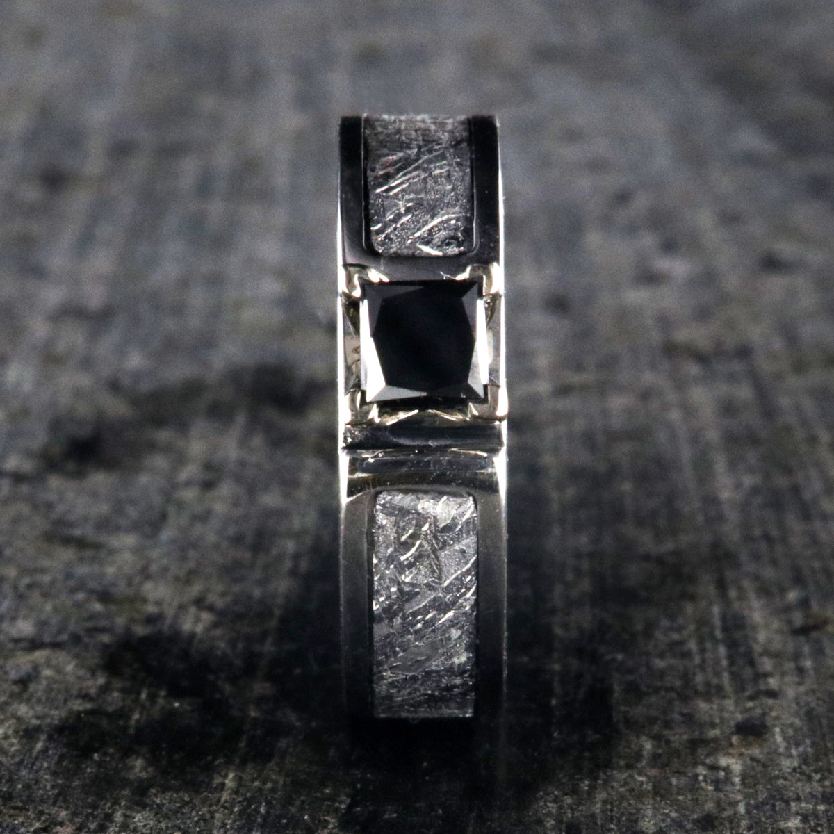 6mm wide meteorite engagement ring with princess cut black diamond
