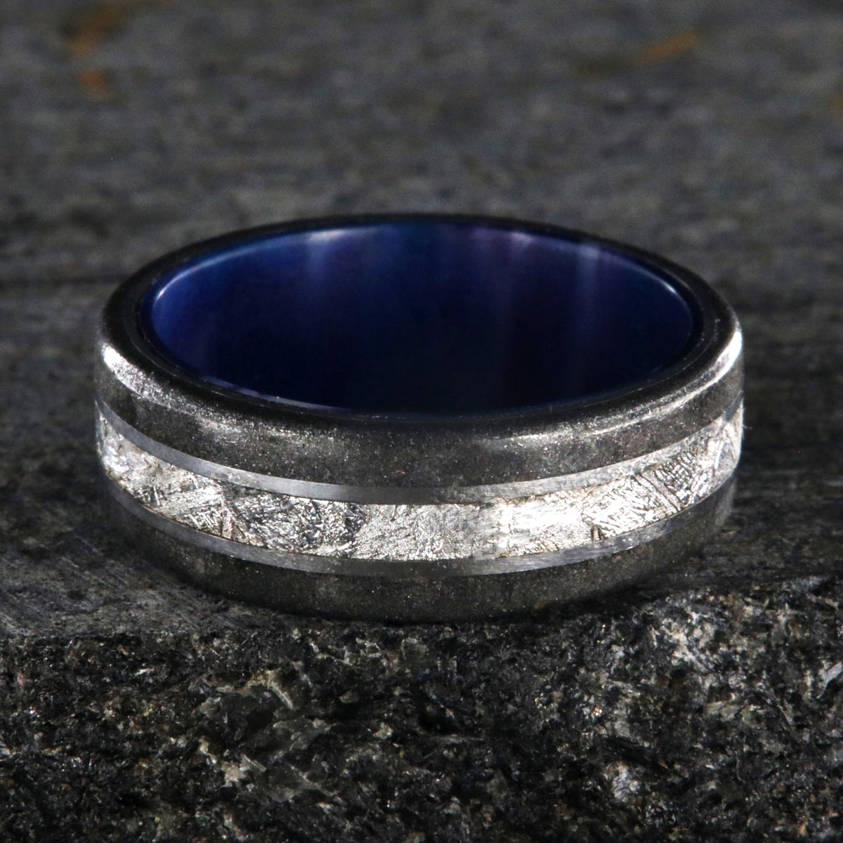 8mm wide meteorite and stardust ring with purple-blue sleeve