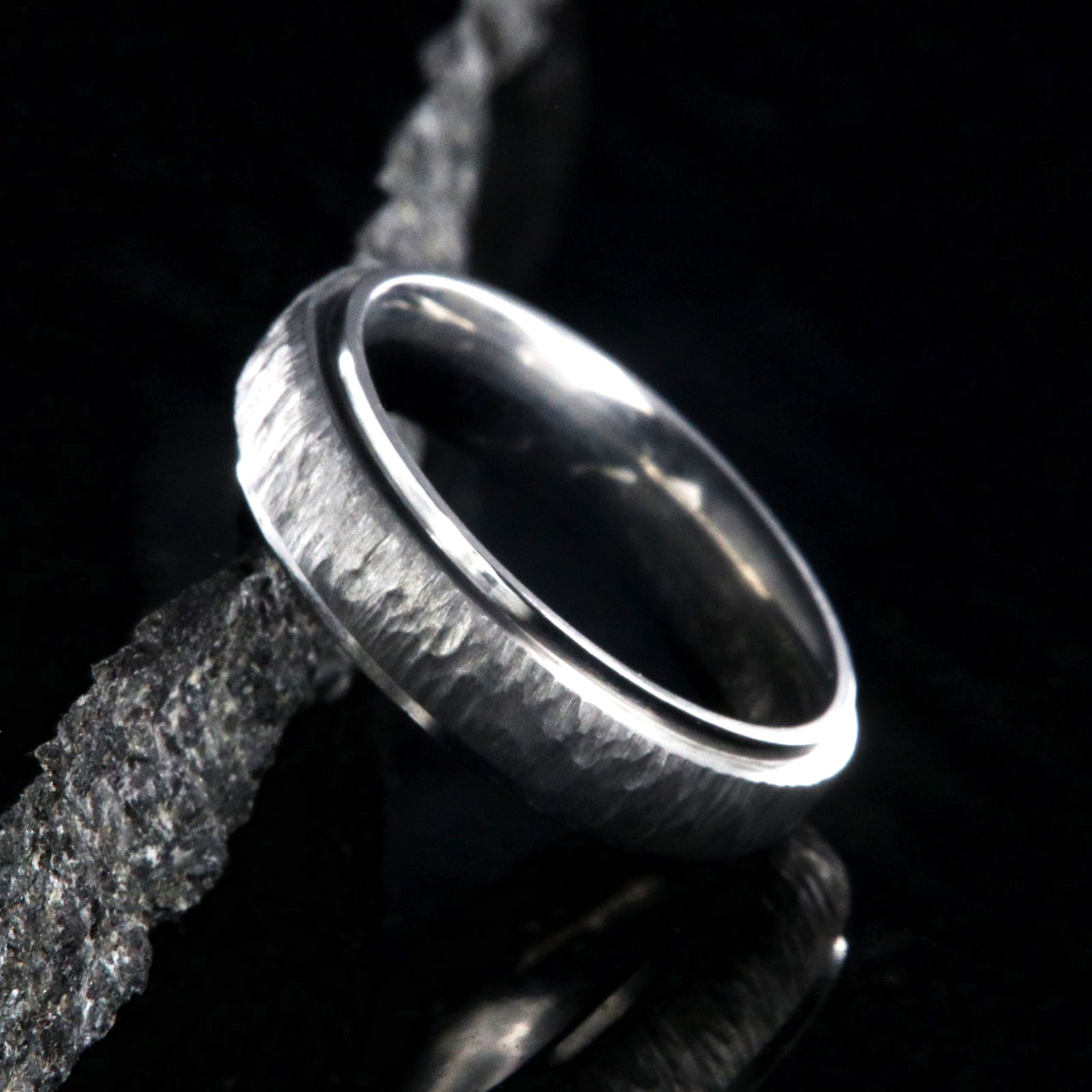 5mm wide titanium wedding band with a raised center and tree bark finish