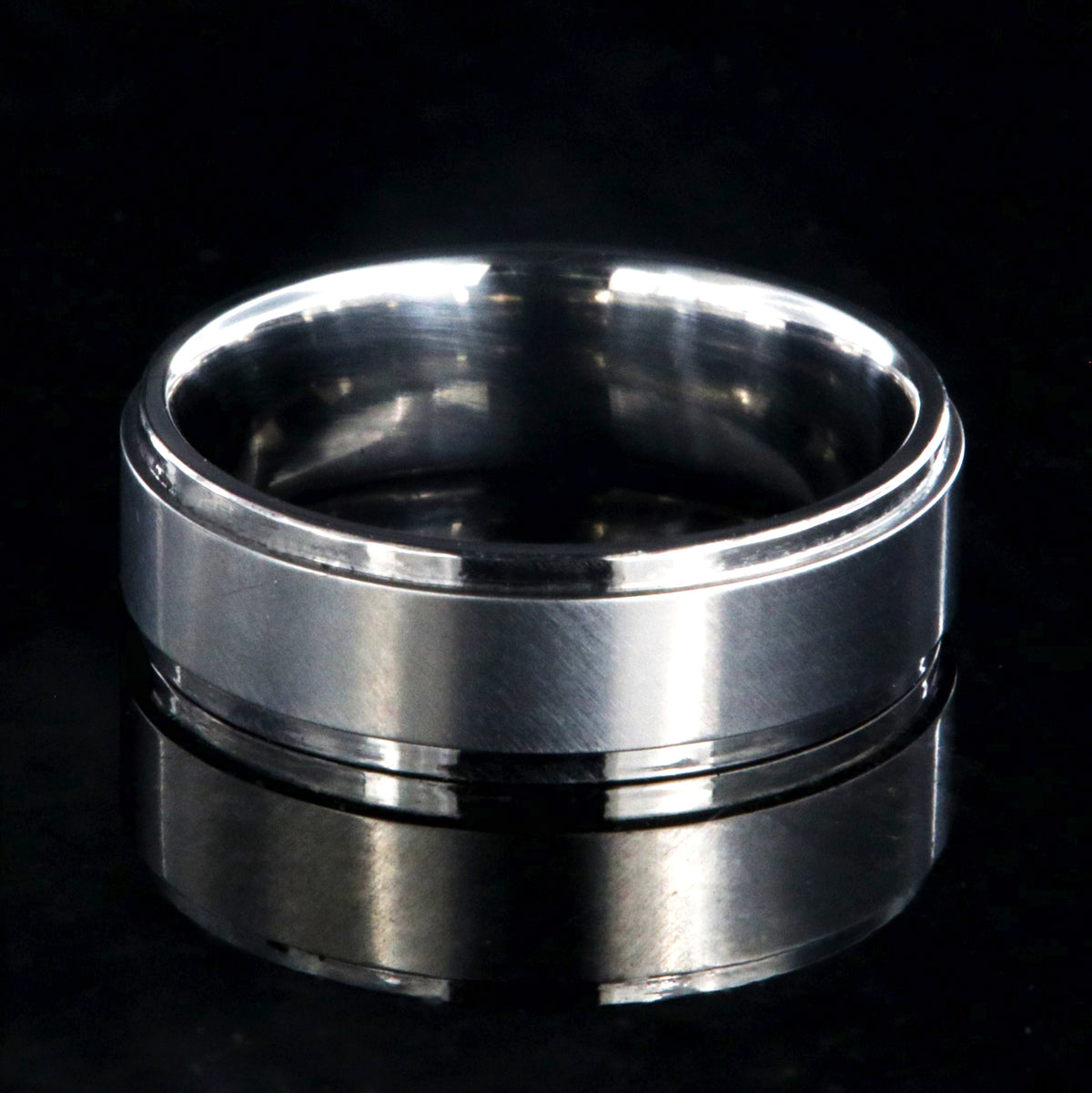 6mm wide titanium wedding band with a raised center
