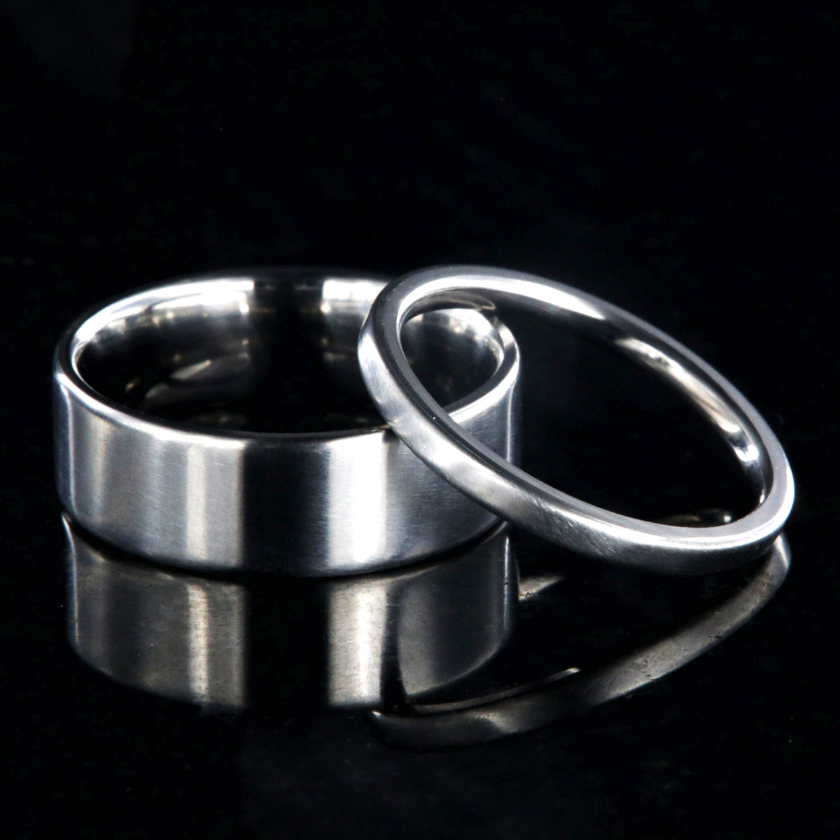7mm and 2mm wide matching titanium wedding band set with a flat profile