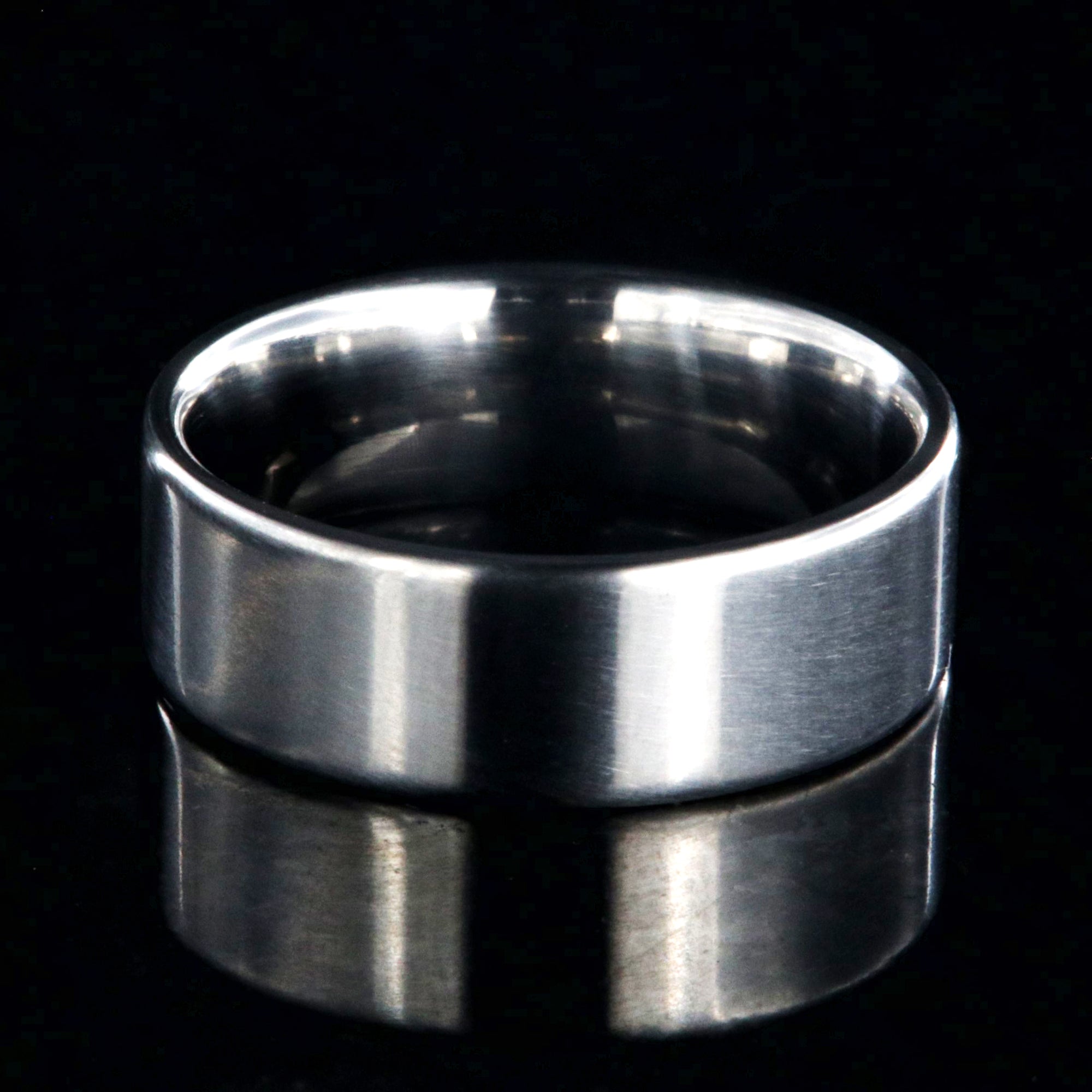 7mm wide titanium wedding band with a flat profile