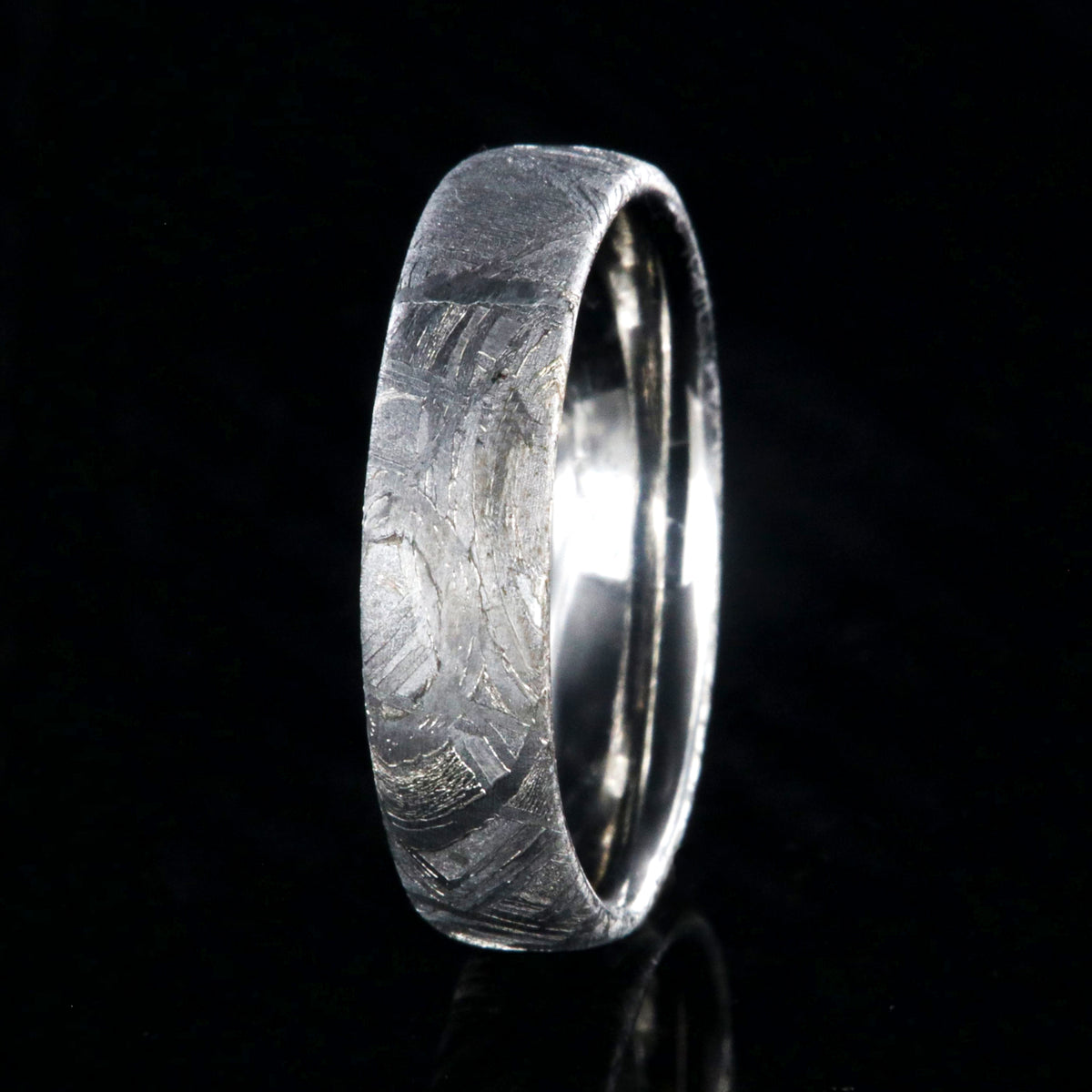 6mm wide meteorite ring made with Muonionalusta meteorite and a polished cobalt sleeve