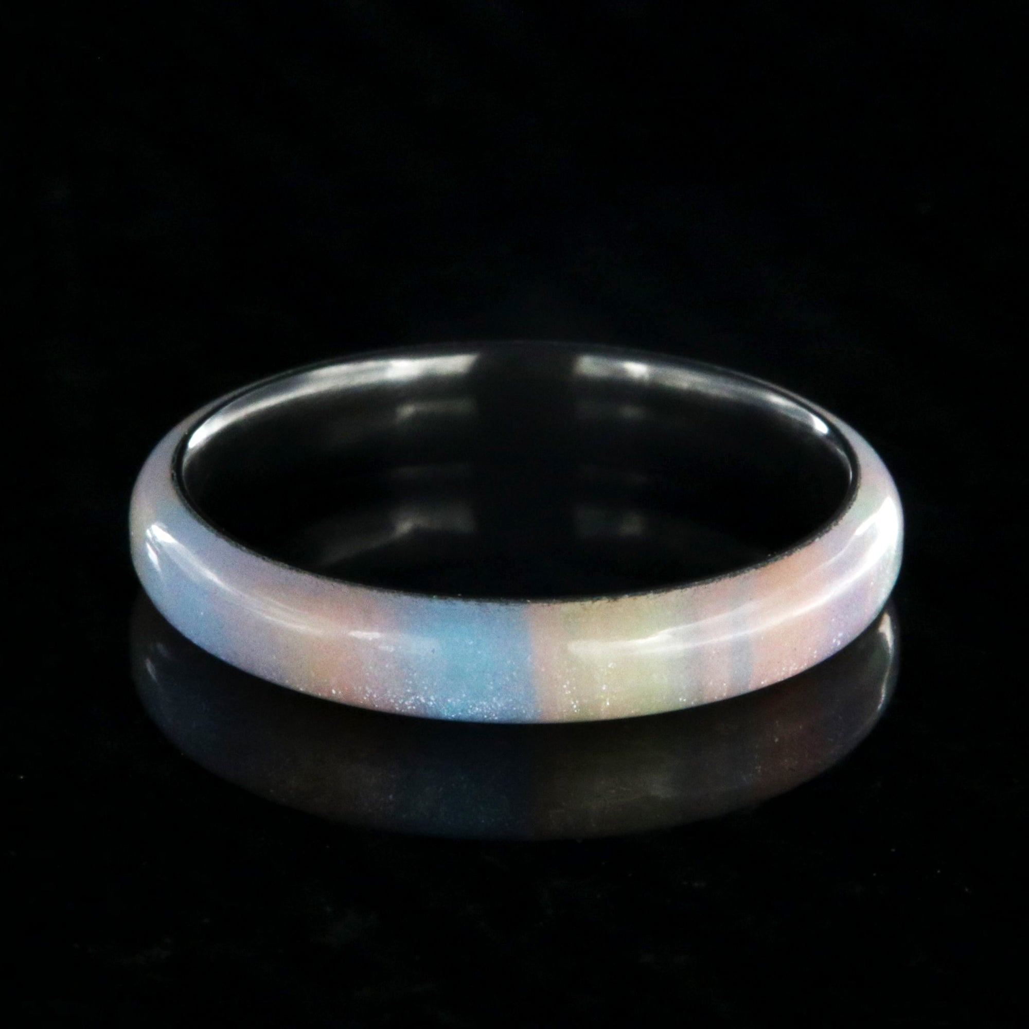4mm wide promise ring with a rainbow outside and black zirconium sleeve
