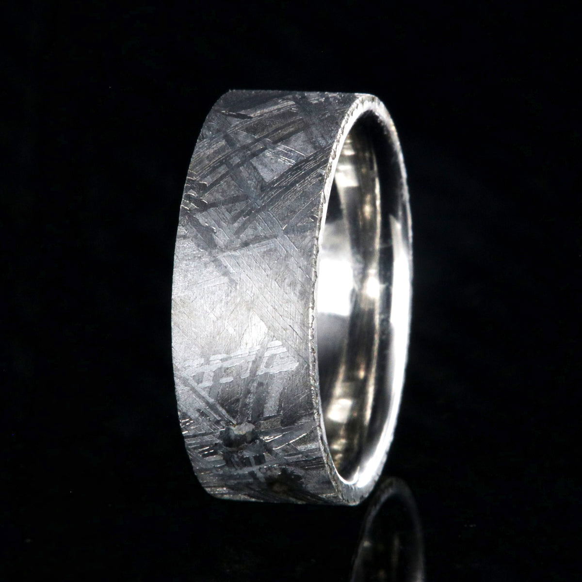 8mm wide Muonionalusta meteorite wedding band for me with flat profile and polished cobalt sleeve