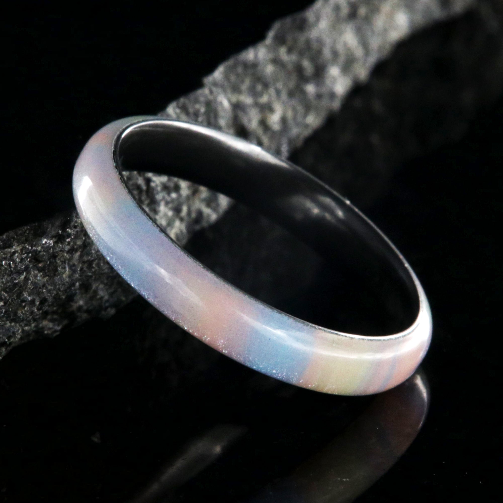 4mm wide promise ring with a rainbow outside and black zirconium sleeve