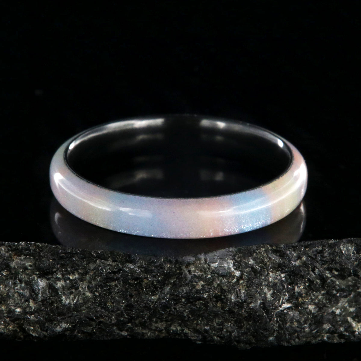 4mm wide promise ring with a rainbow outside and black zirconium sleeve