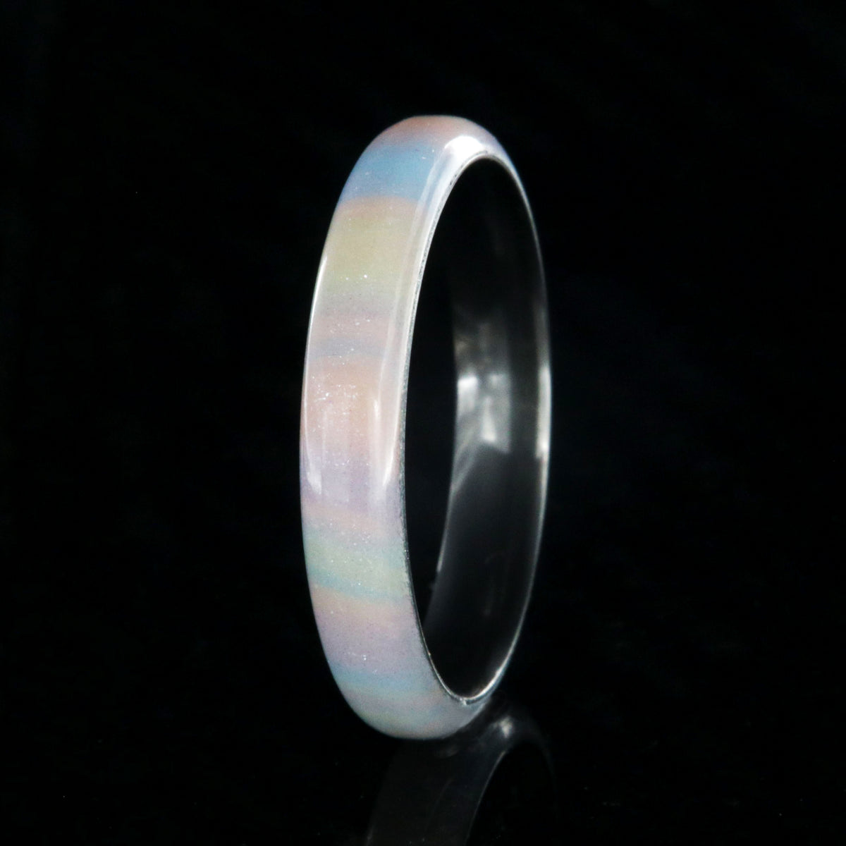 4mm wide promise ring with a rainbow outside and black zirconium sleeve