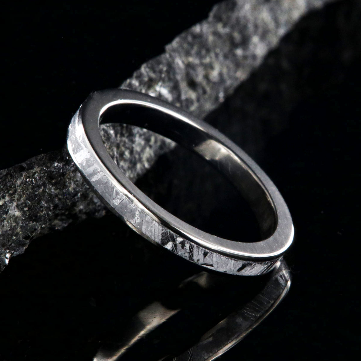 3mm wide women&#39;s meteorite wedding band with titanium edges and sleeve