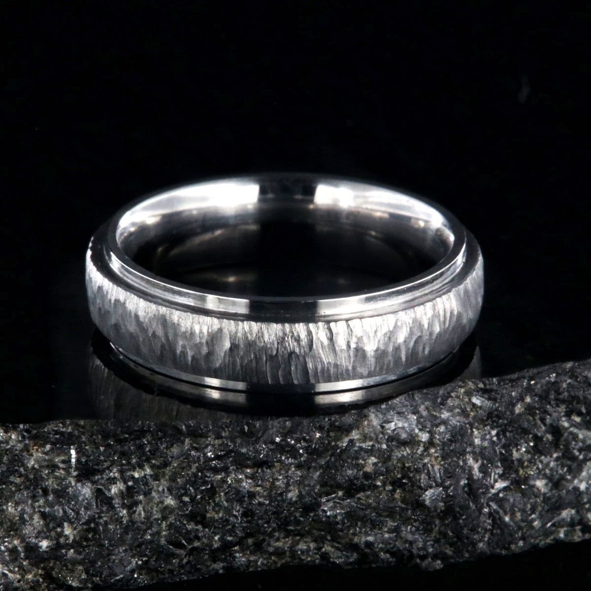 5mm wide titanium wedding band with a raised center and tree bark finish