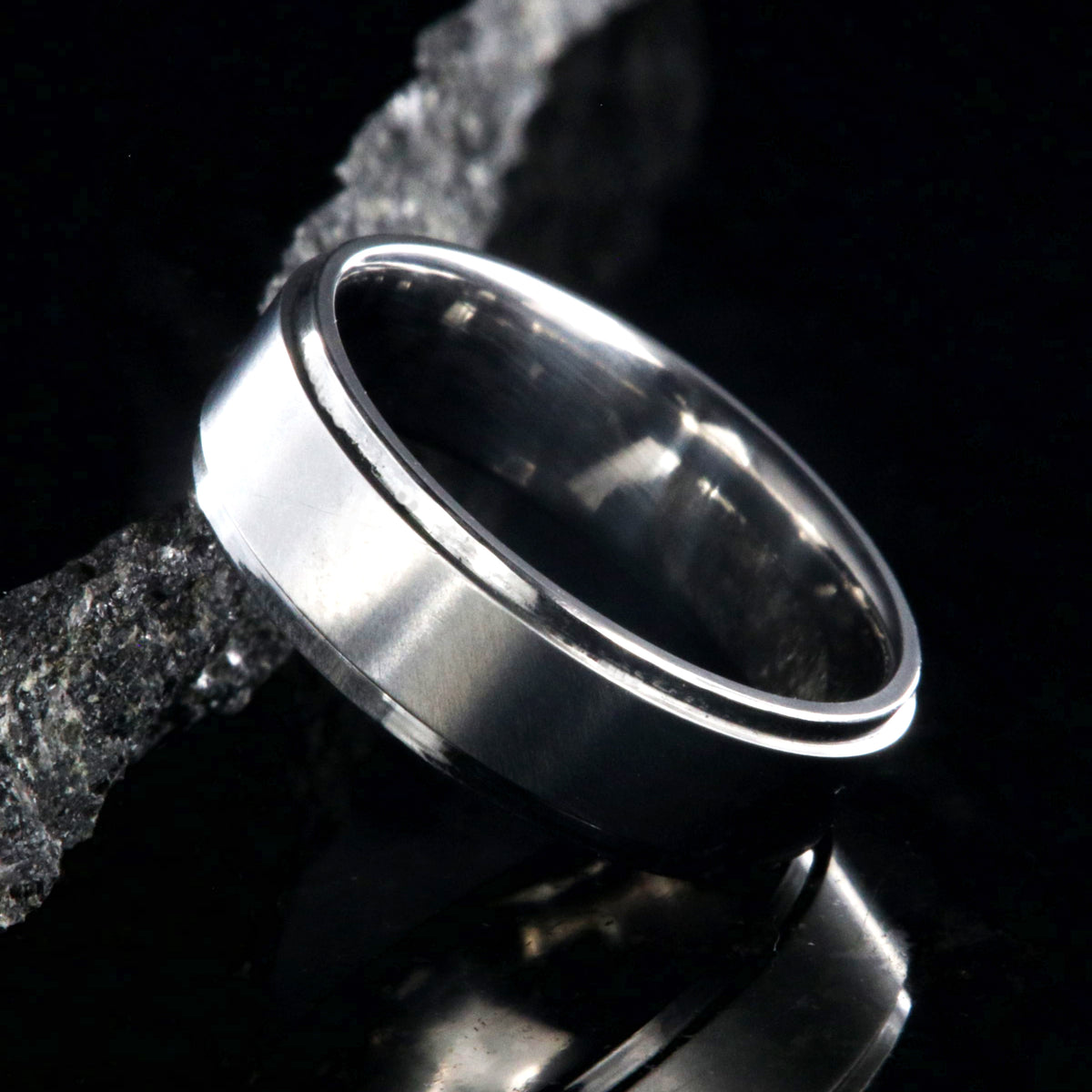 6mm wide titanium wedding band with a raised center