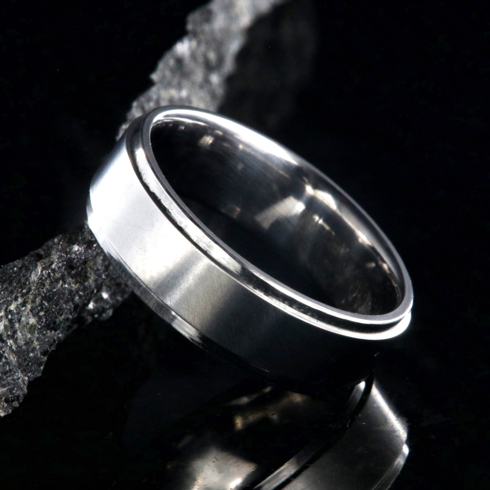 6mm wide titanium wedding band with a raised center