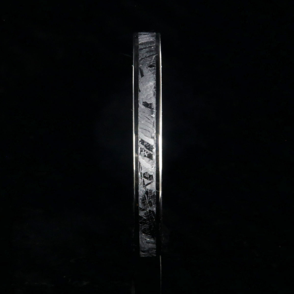 3mm wide women&#39;s meteorite wedding band with titanium edges and sleeve