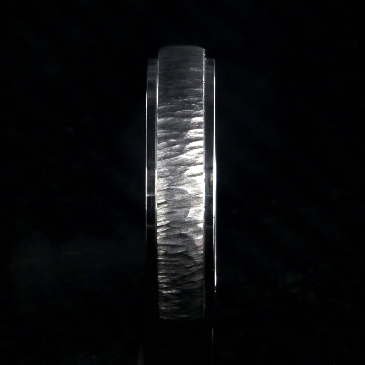 5mm wide titanium wedding band with a raised center and tree bark finish