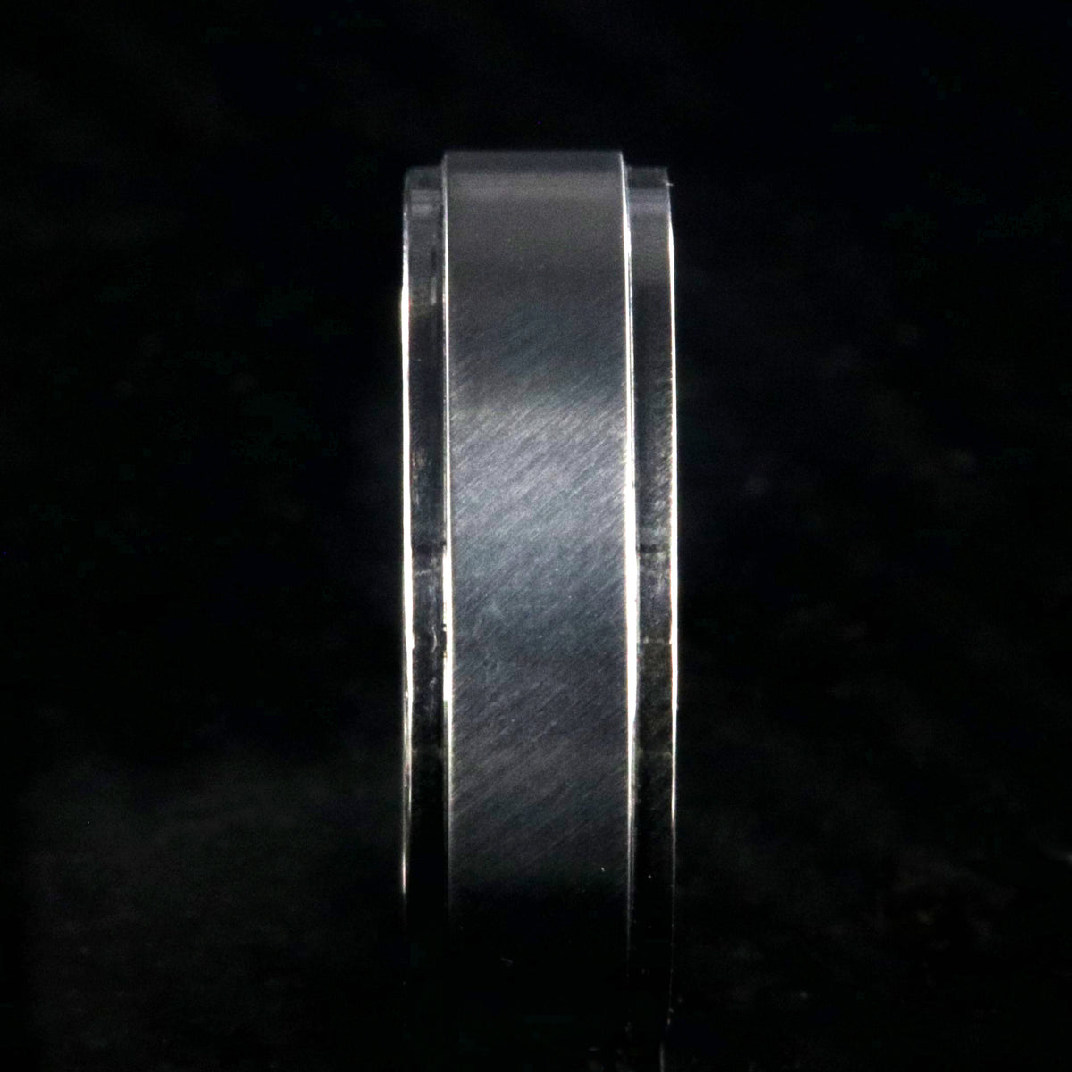 6mm wide titanium wedding band with a raised center
