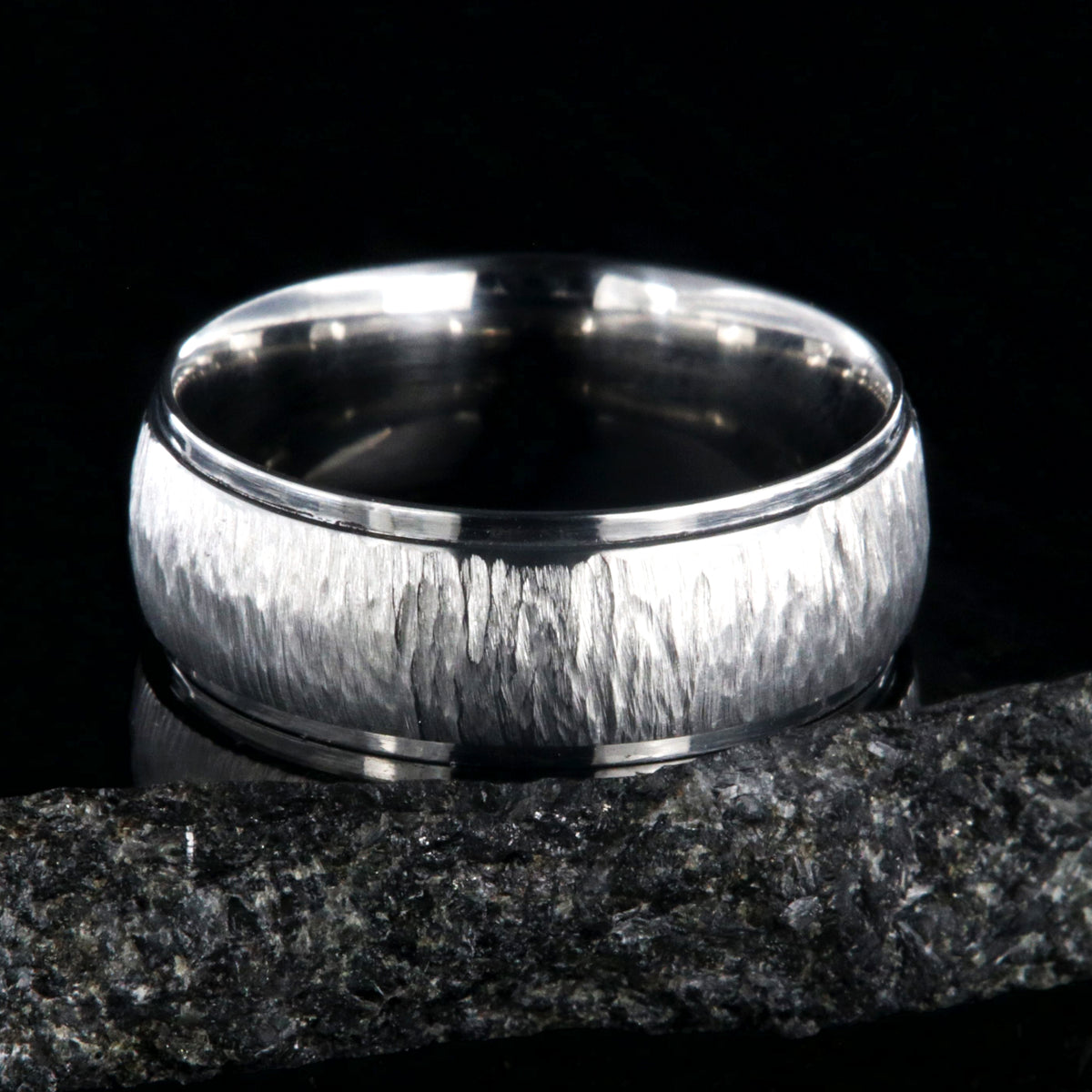 8mm wide titanium wedding band with a raised center and tree bark finish
