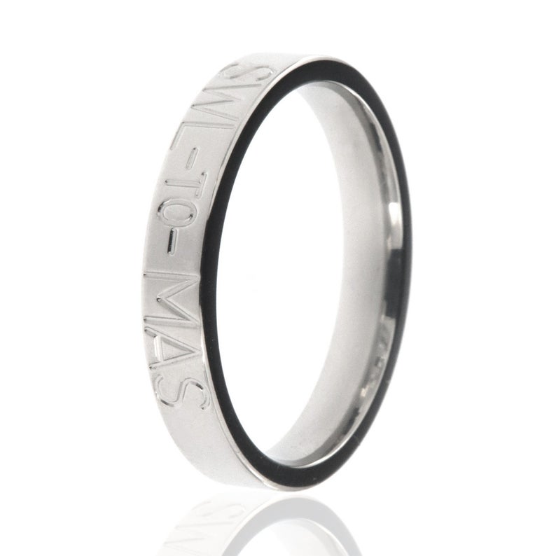 4mm wide women's titanium duck band ring with one ling of custom text