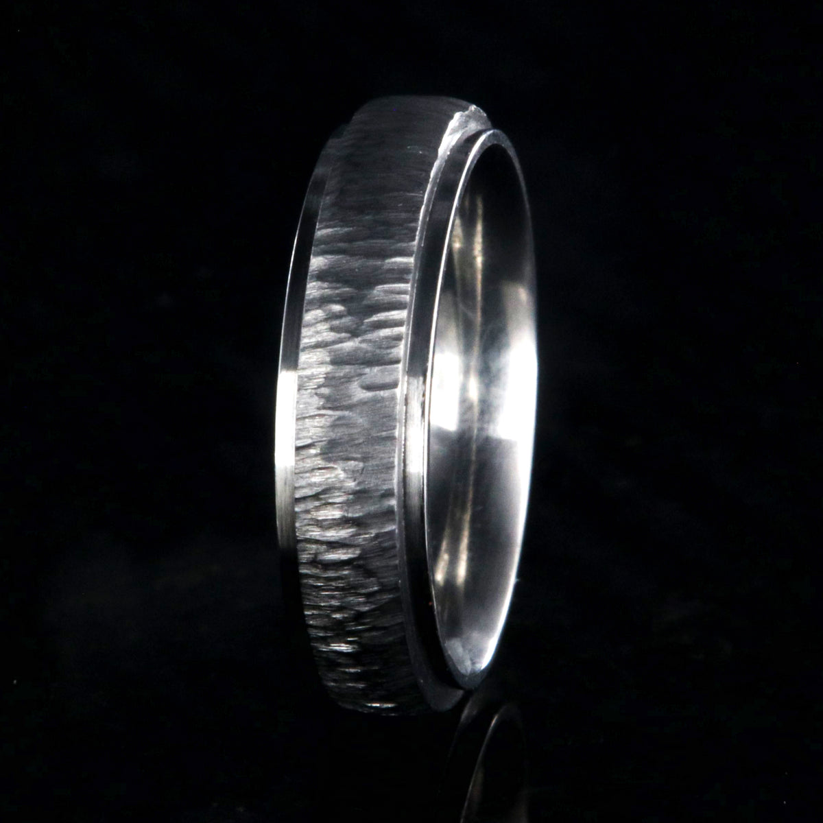 5mm wide titanium wedding band with a raised center and tree bark finish