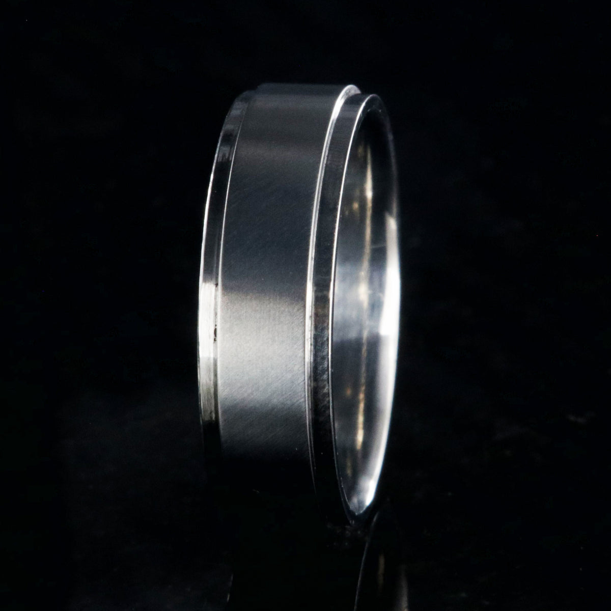 6mm wide titanium wedding band with a raised center