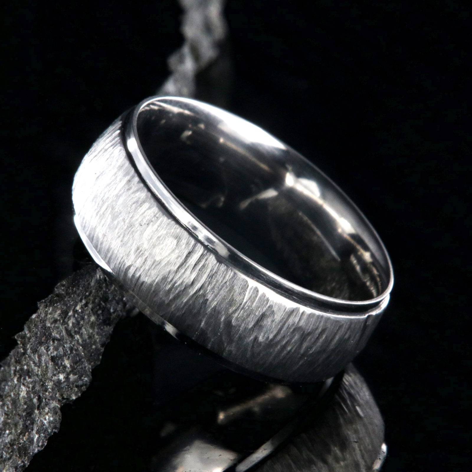 8mm wide titanium wedding band with a raised center and tree bark finish