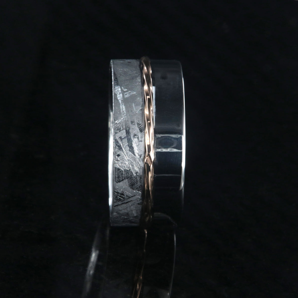 8mm wide men&#39;s wedding band with one half meteorite and the other of polish cobalt with a twisted rose gold inlay