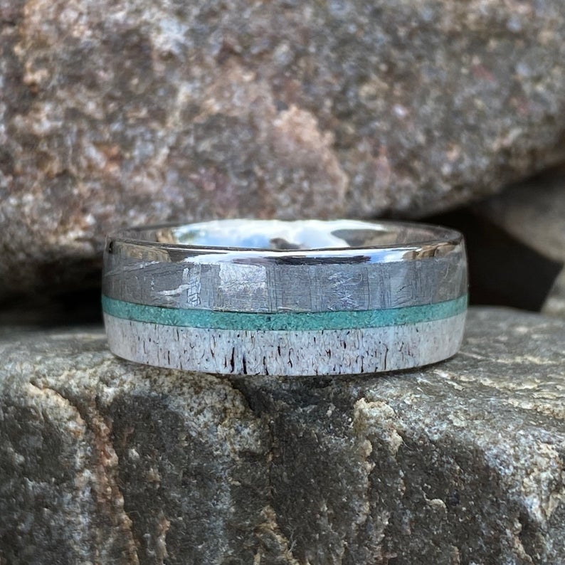 8mm wide men&#39;s wedding ring with a thin turquoise center inlay, a Gibeon meteorite edge, and an antler edge