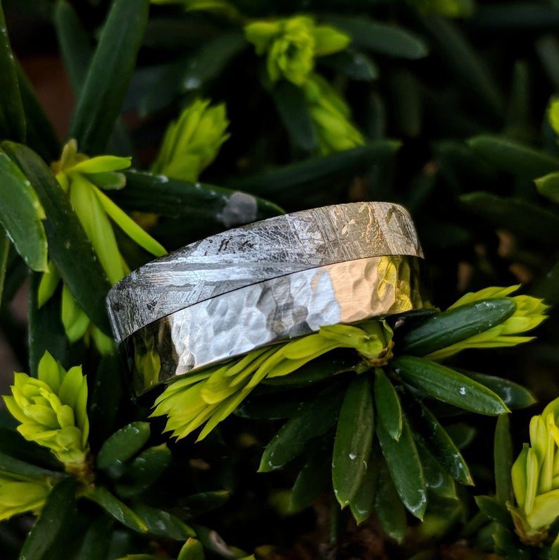 8mm wide cobalt and meteorite wedding ring with half the band covered in meteorite and the other half with hammered polished cobalt