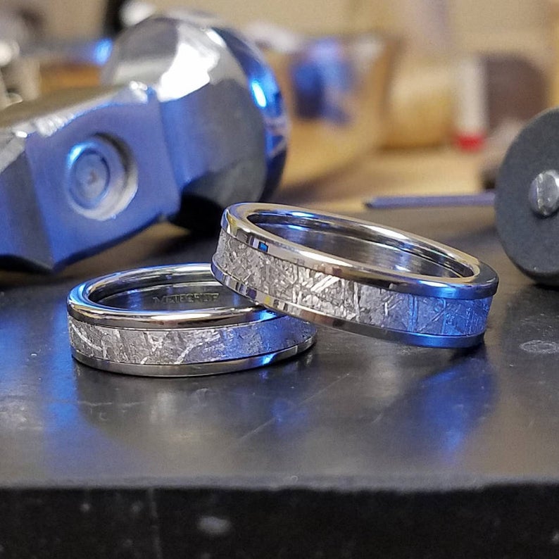 5mm and 4mm wide matching meteorite wedding band set with cobalt edges and sleeve