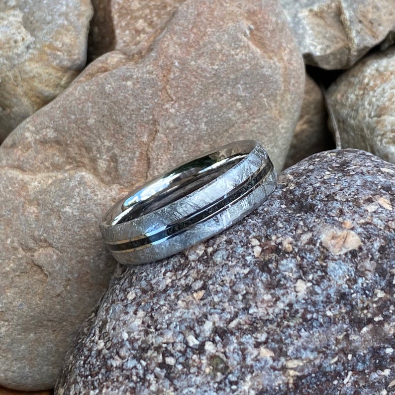 5mm wide meteorite wedding band with a black stardust center inlay 