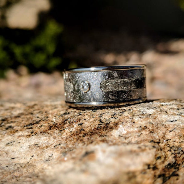 10mm wide meteorite memorial ring with 3mm center ashes and bezel set 3mm diamond