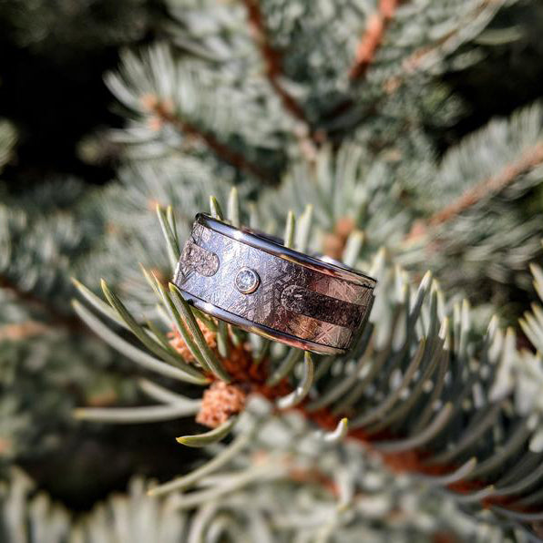 10mm wide meteorite memorial ring with 3mm center ashes and bezel set 3mm diamond