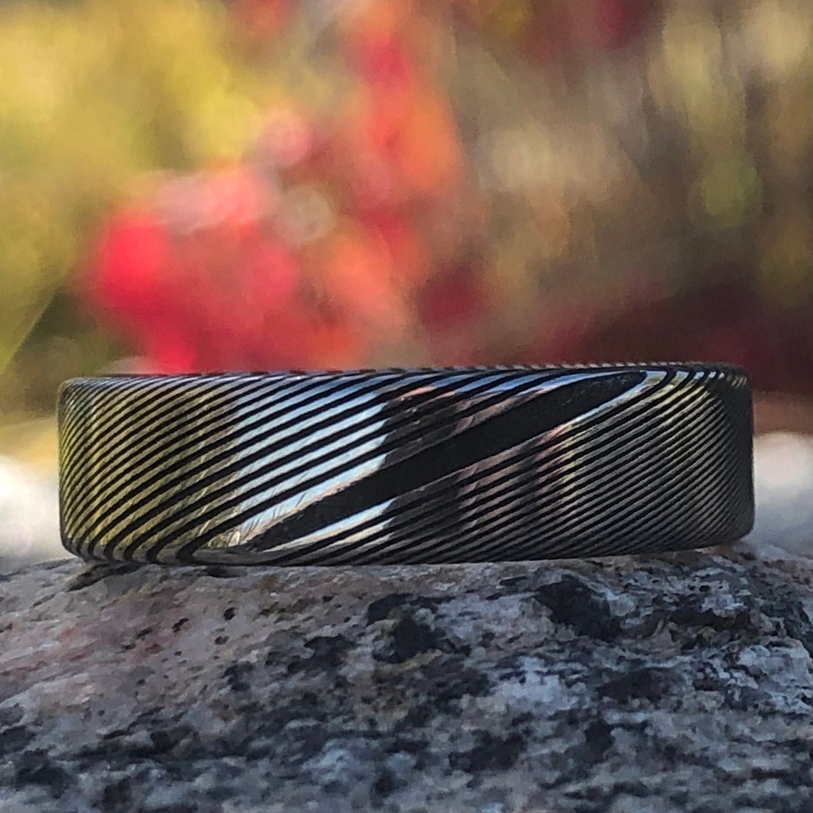 6mm wide Damascus steel wedding band with a flat profile