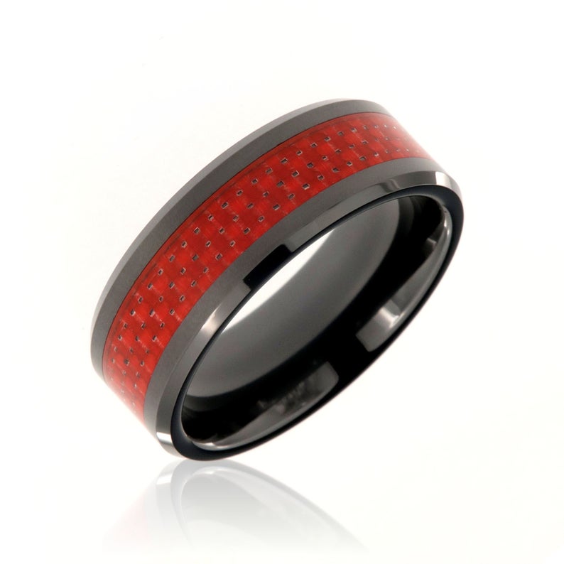 8mm wide black tungsten ring with red carbon fiber inlay and beveled edges